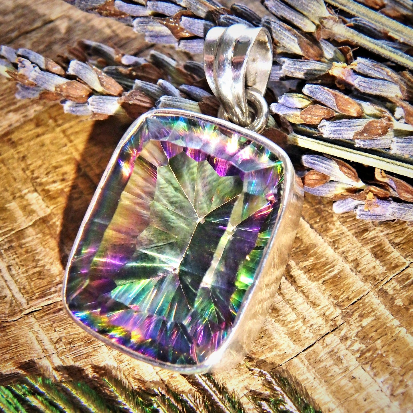 Hypnotic Brilliance Mystic Topaz Sterling Silver Pendant (Includes Silver Chain)