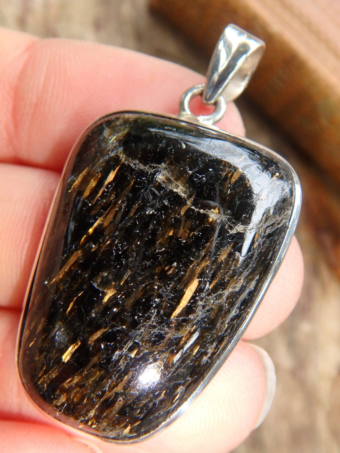 Dancing Golden Flashes Genuine Nuummite Pendant In Sterling Silver (Includes Silver Chain)1