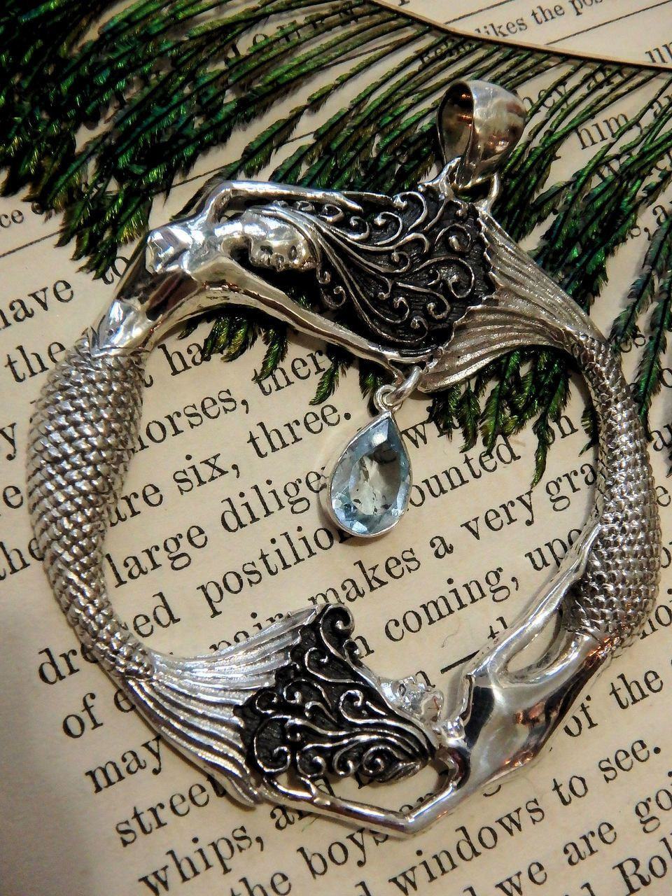  Dancing Mermaids & Faceted Blue Topaz Pendant in Sterling Silver (Includes Silver Chain)