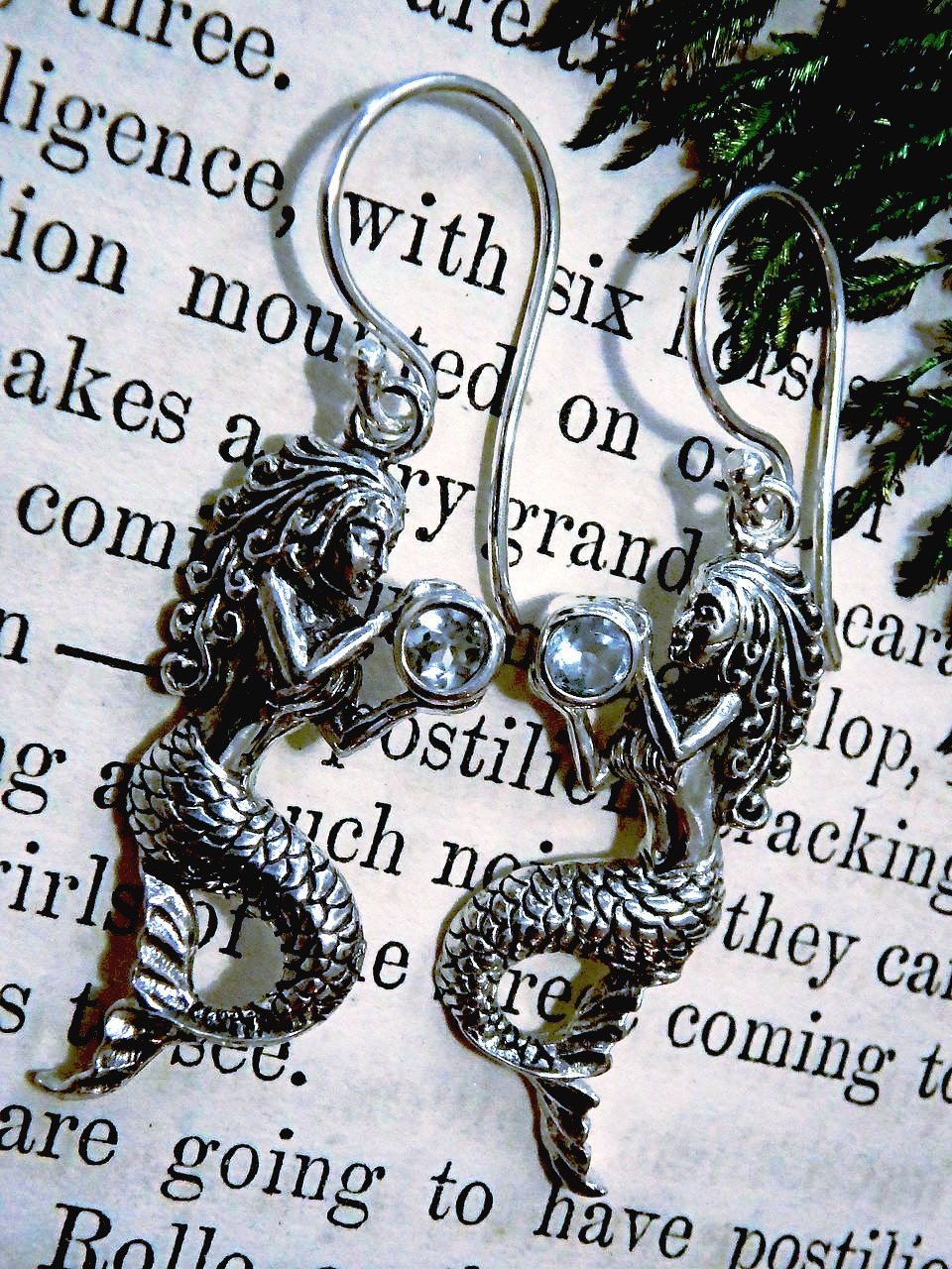 Mermaids Holding Faceted Blue Topaz Gemstone Earrings in Sterling Silver - Earth Family Crystals
