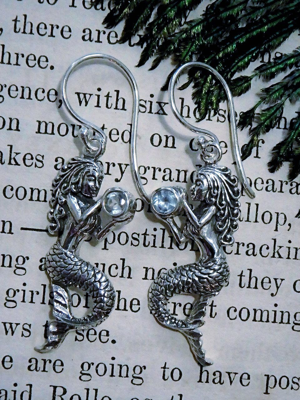 Mermaids Holding Faceted Blue Topaz Gemstone Earrings in Sterling Silver - Earth Family Crystals