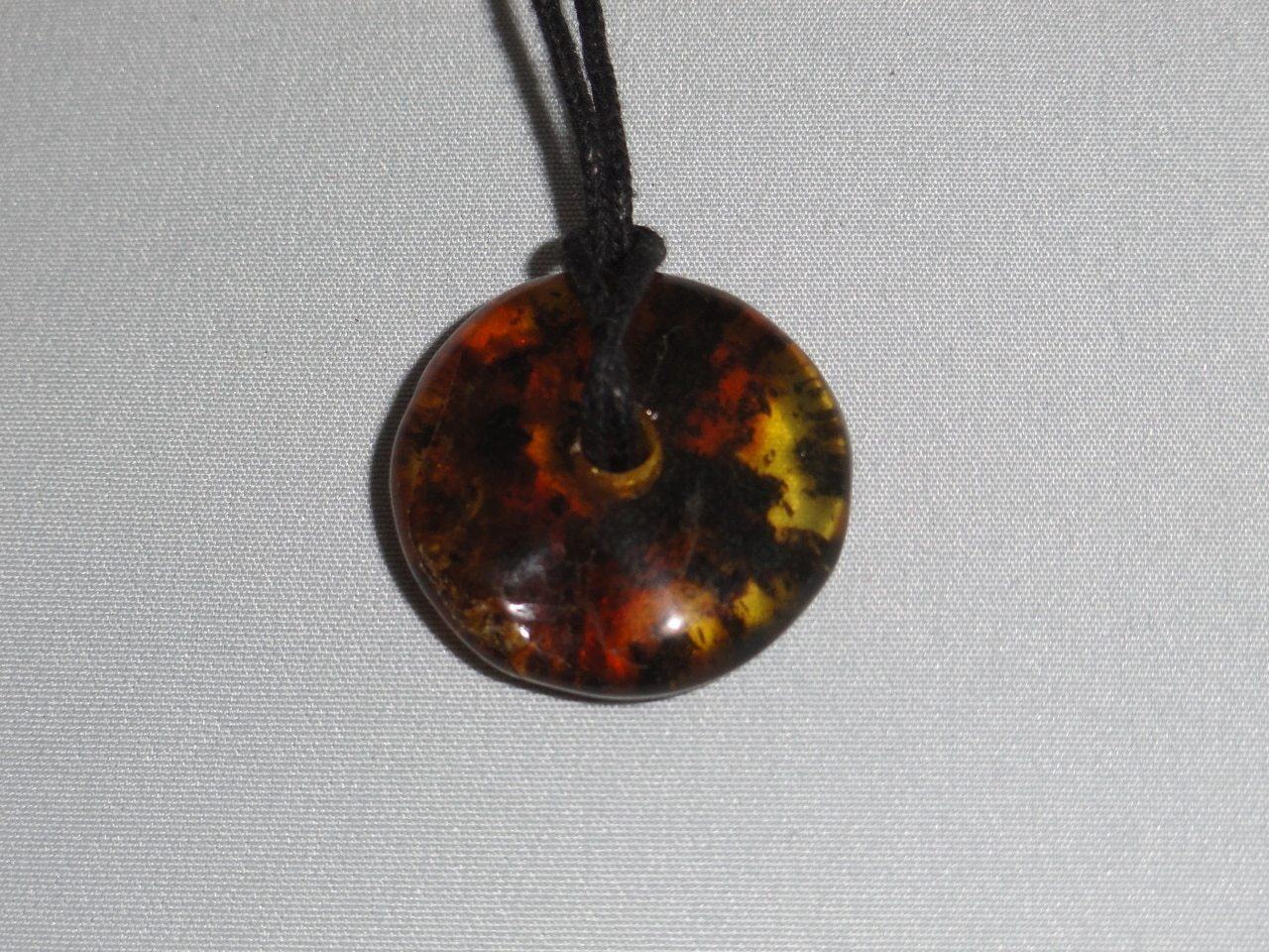  BALTIC AMBER GREEN DONUT  PENDANT~ CALMS NERVES, INCREASES CONFIDENCE & MENTAL CLARITY*
