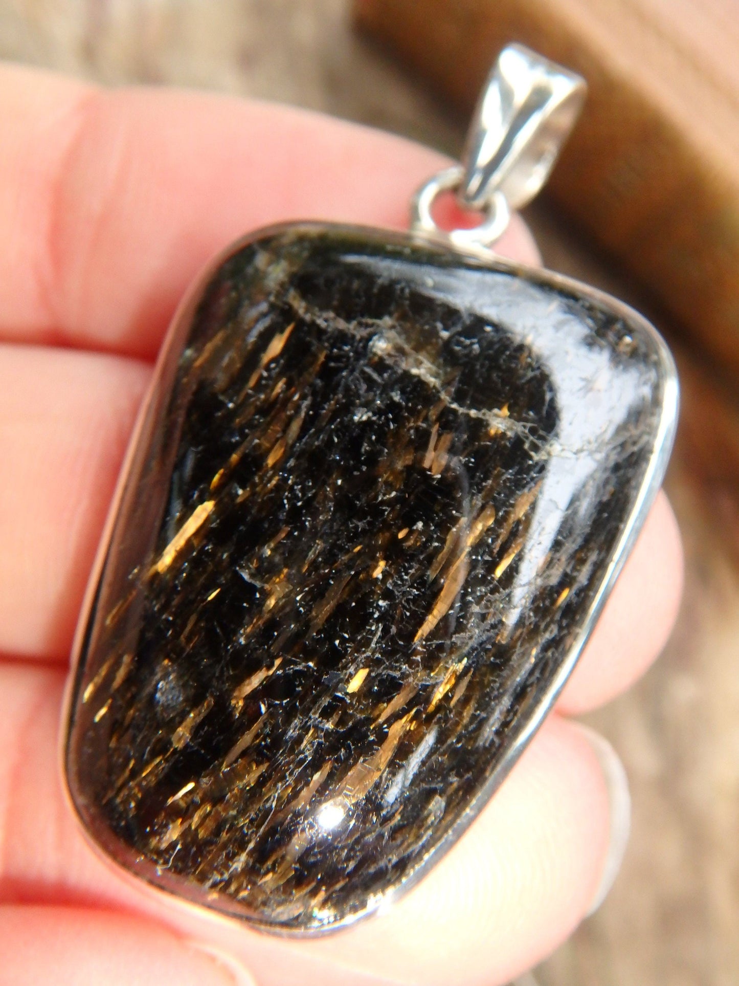 Dancing Golden Flashes Genuine Nuummite Pendant In Sterling Silver (Includes Silver Chain)1