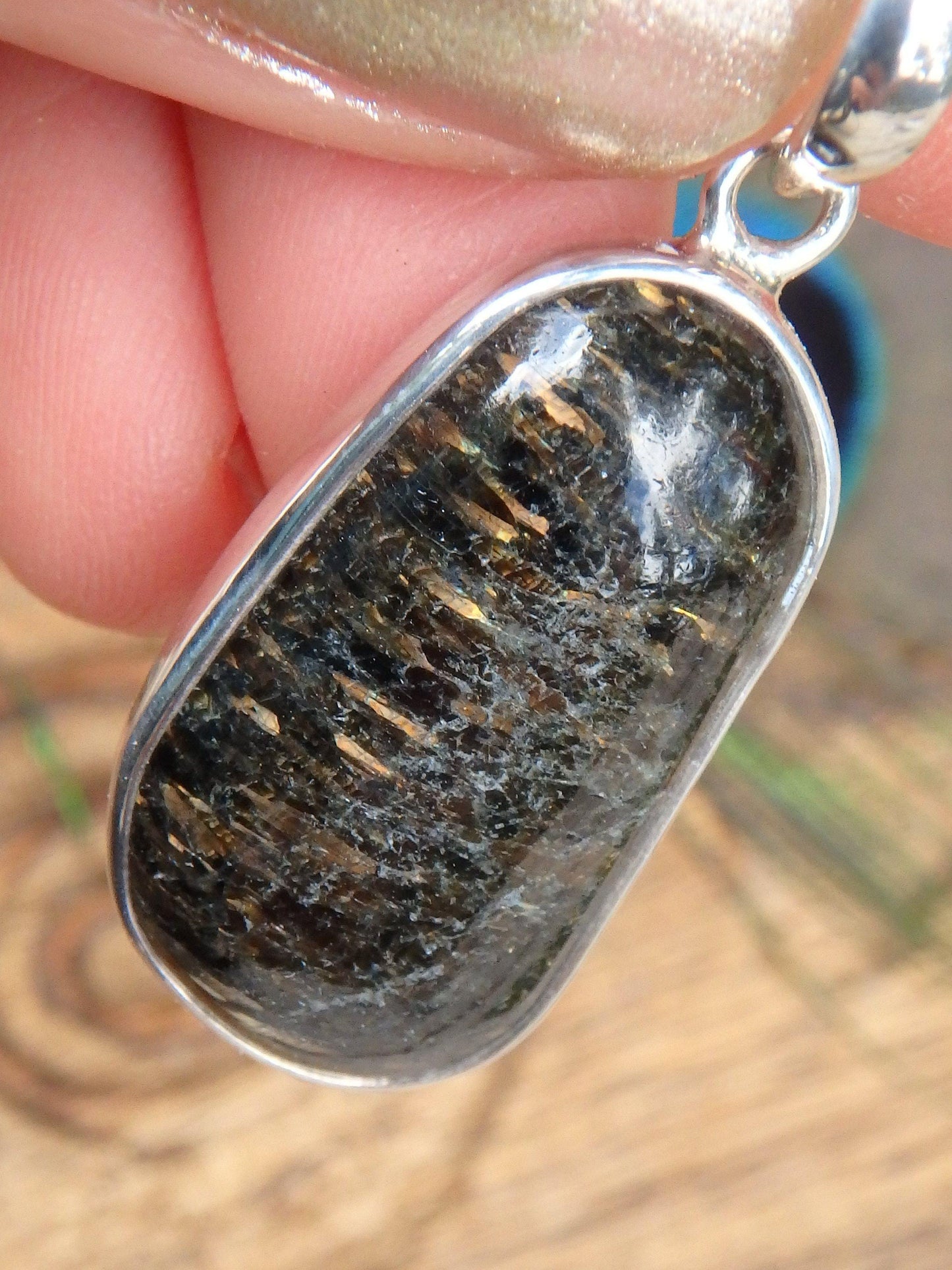  Brilliant Golden Flashes Nuummite From Greenland Pendant in Sterling Silver (Includes Silver Chain) 2