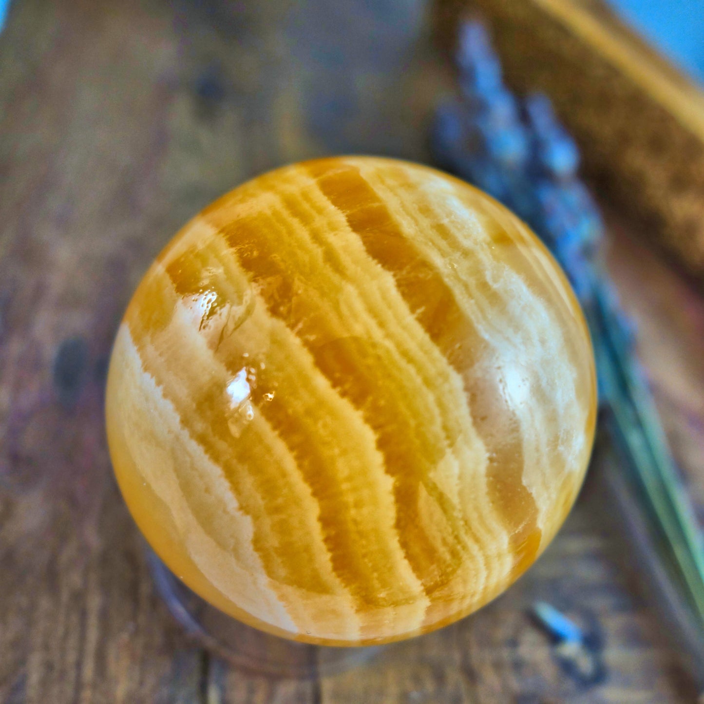 Lush Layers Orange Calcite Sphere Carving - Earth Family Crystals