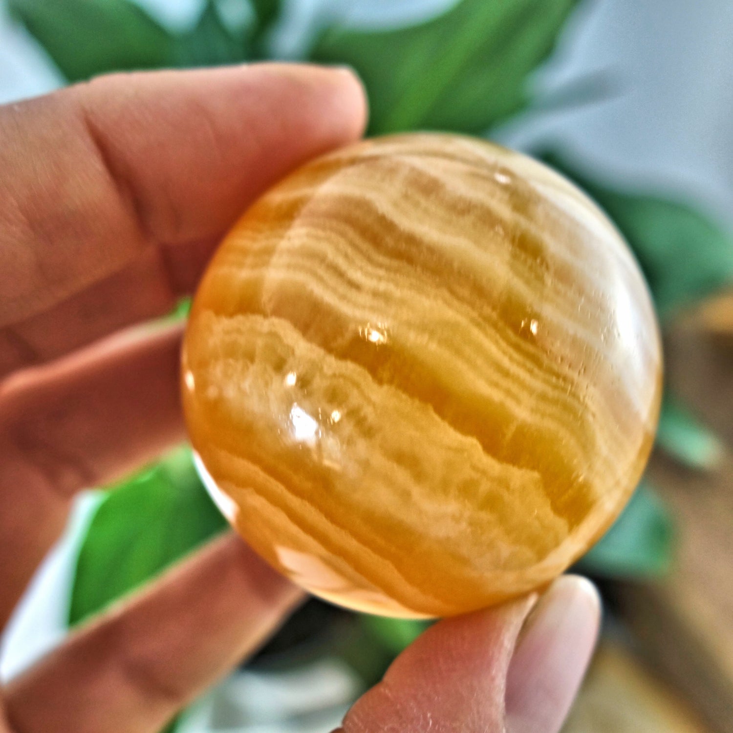 Lush Layers Orange Calcite Sphere Carving - Earth Family Crystals