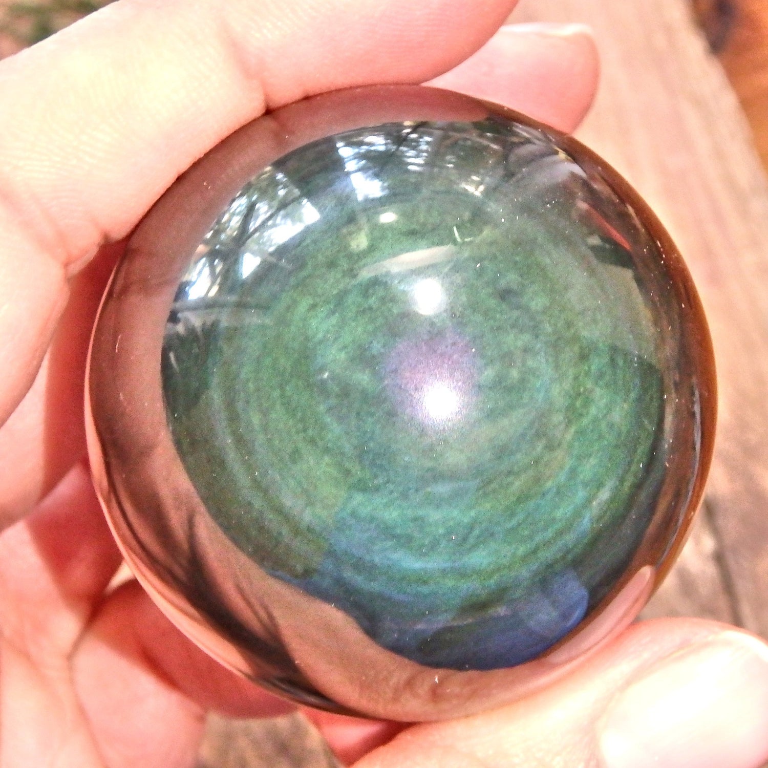 Mysterious Glimpses of Color Rainbow Obsidian Sphere Carving - Earth Family Crystals