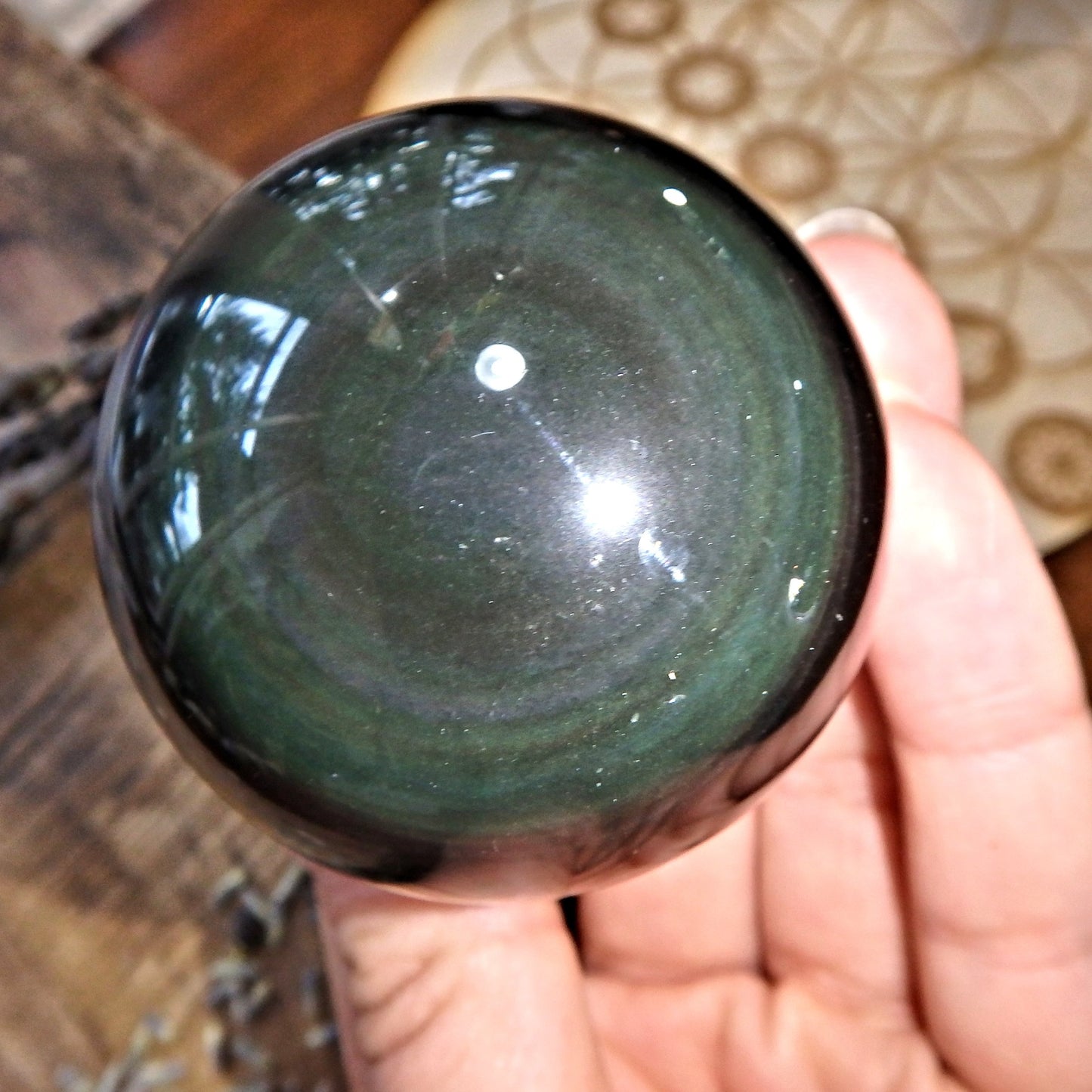 Mysterious Flashes of Color Rainbow Obsidian Sphere Carving 8 - Earth Family Crystals