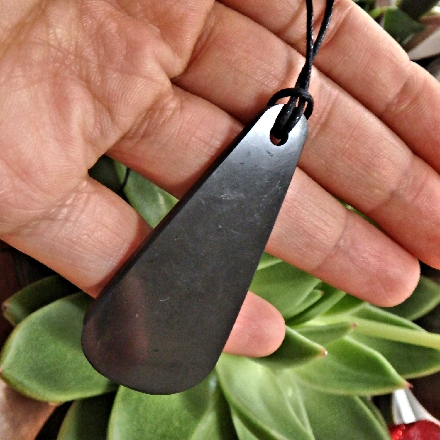 Healing Polished Shungite EMF Protective Pendant on Cotton Cord 1 - Earth Family Crystals