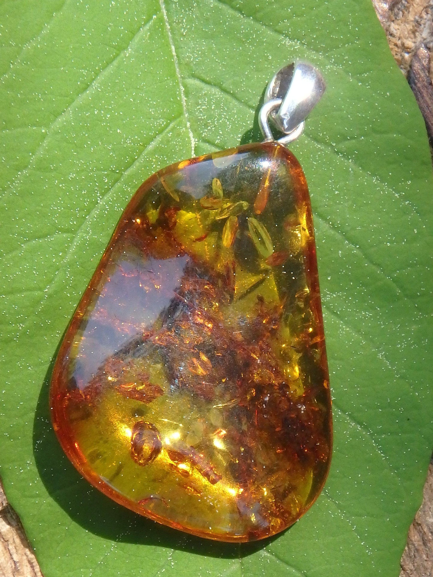  Cognac Lithuanian Amber Free Form Pendant Pendant In Sterling Silver (Includes Silver Chain)